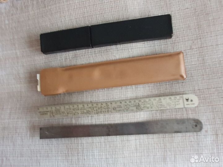 Логарифмические линейки 1960 г и 1975 г