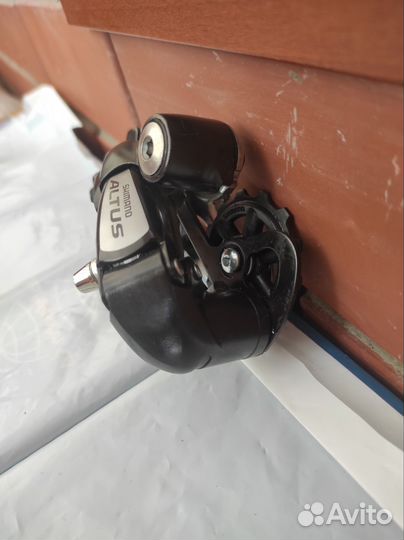 Задний переключатель Shimano Altus 7 скоростей