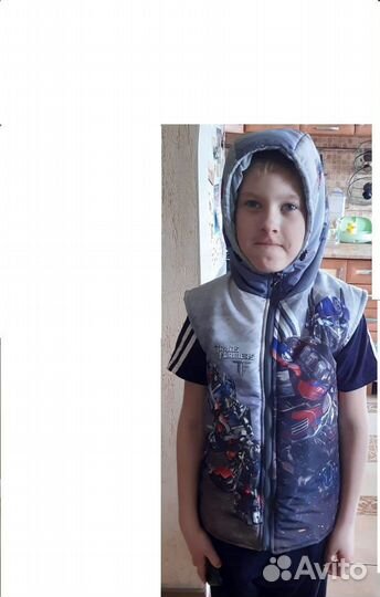 Новый жилет с трансформерами р.134-140