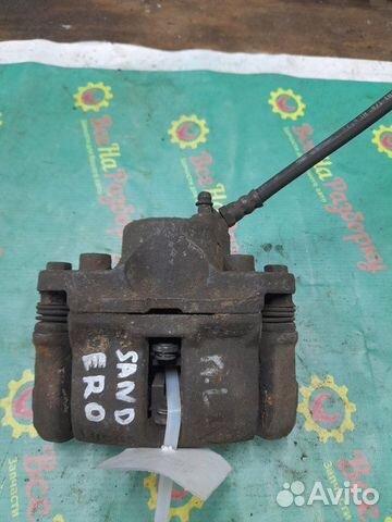 Суппорт передний левый Renault Sandero хечбэк 1.4