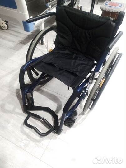 Инвалидная коляска