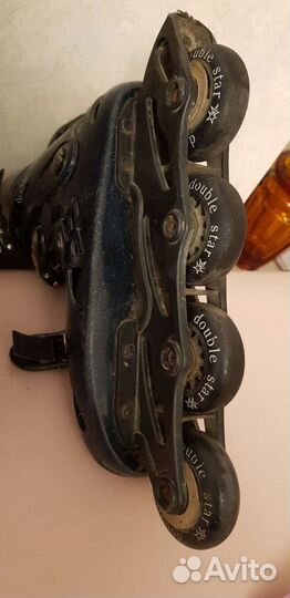 Роликовые коньки