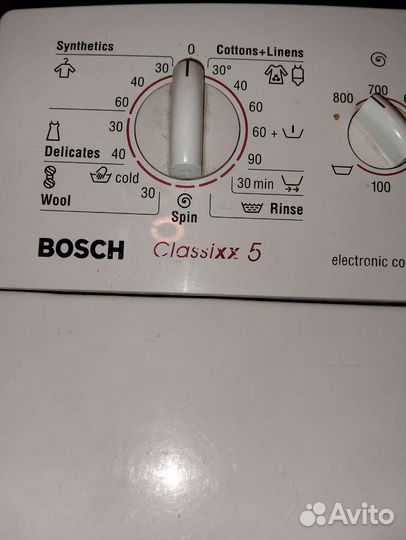 Стиральная машина Bosch с вертикальной загрузкой