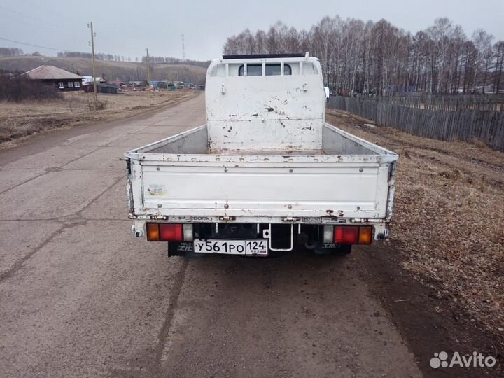 Авито партизанское. Дром Улан-Удэ Грузовики бортовые. Кантер бортовой фото катафоты на кузов. Кантер бортовой фото с заду.