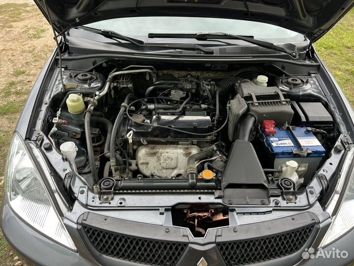 Mitsubishi Lancer 1.6 МТ, 2009, 199 129 км