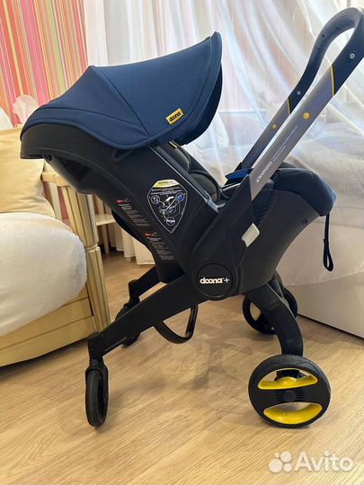 Автокресло коляска Doona+ с базой isofix