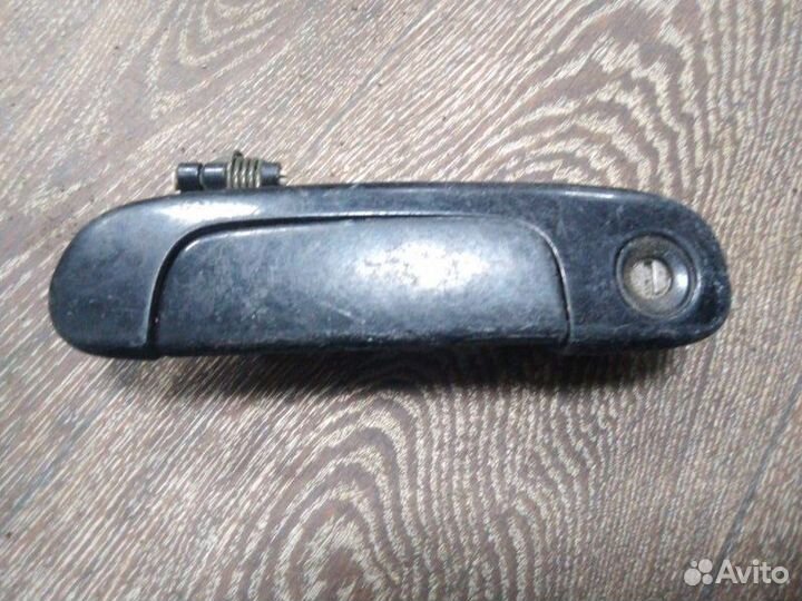 Ручка двери внешняя передняя левая Mazda 323 BJ