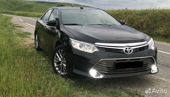 Передний бампер (оригинал) Toyota Camry 55