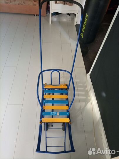 Детские санки с выдвижными колесами