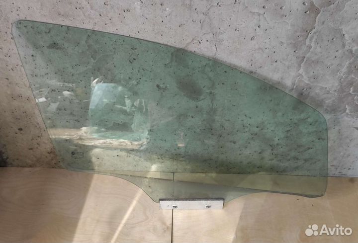 Стекло двери левой передней Opel Corsa D