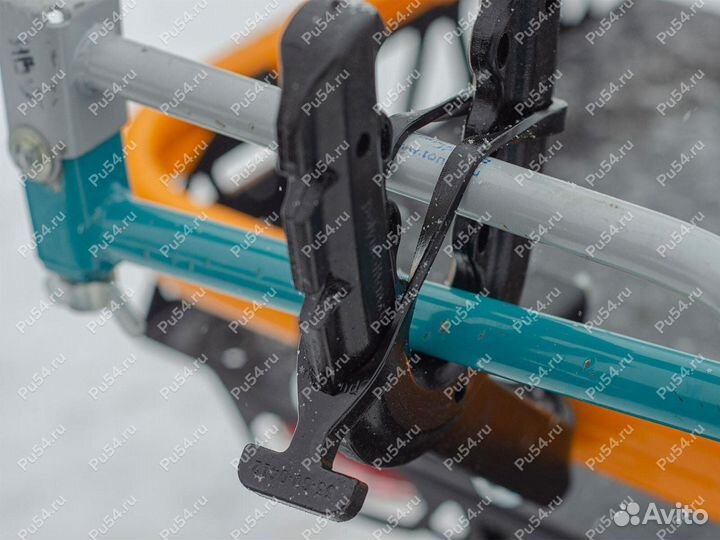 Крепление бура на снегоходе