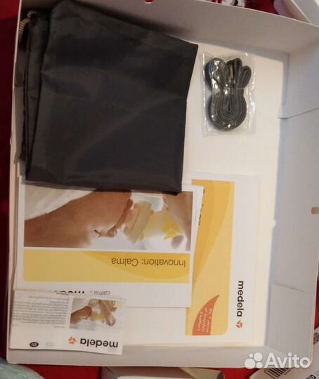 Молокоотсос medela электрический