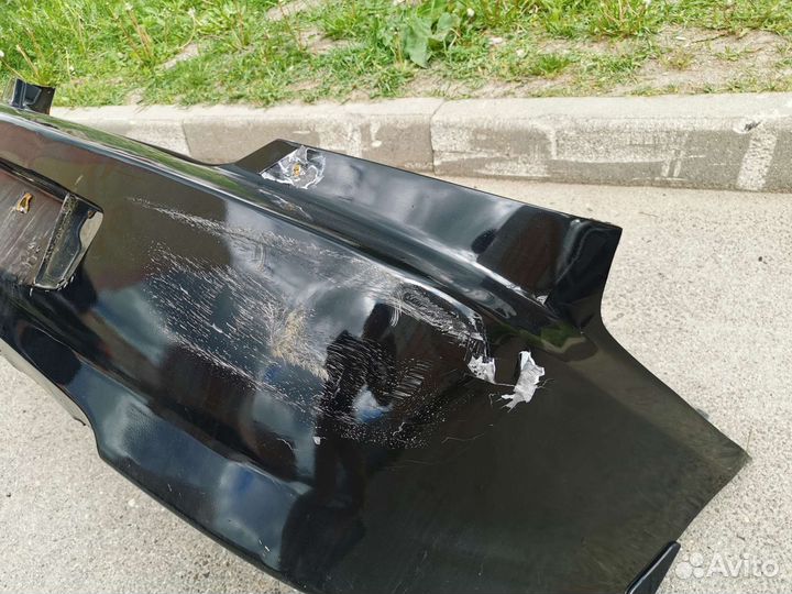 Бампер задний Kia Spectra