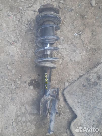 Стойка амортизатора заднего левого Chevrolet Lacet