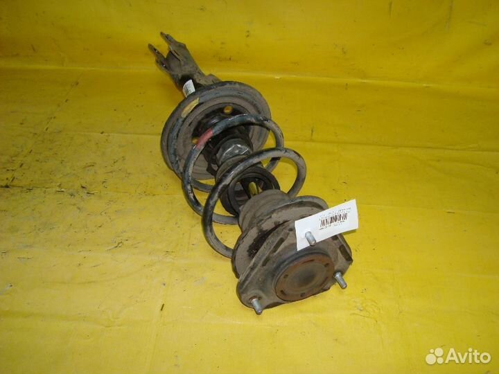 Стойка Toyota Corolla fielder NZE141G (Переднее Левое)