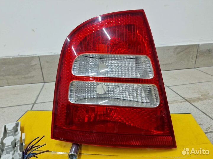 Фонарь задний левый Skoda Octavia Седан Hella