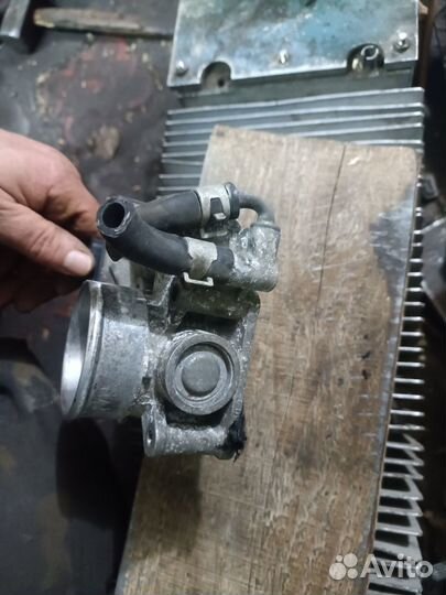 Дроссельная заслонка Nissan Tiida