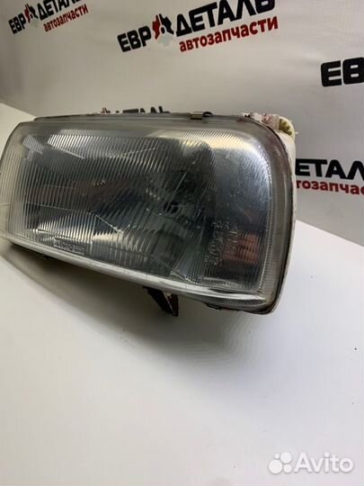 Фара левая Volkswagen Vento седан 1.8 AAM 1992