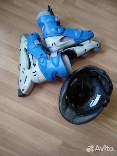 Роликовые коньки