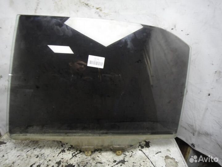 Стекло двери задней левой Lancer 9