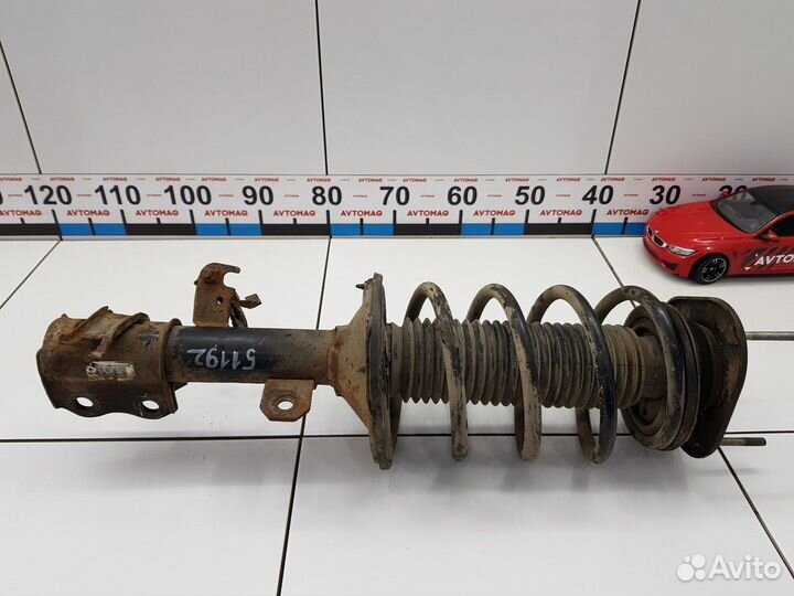 Амортизатор передний правый с пружиной
