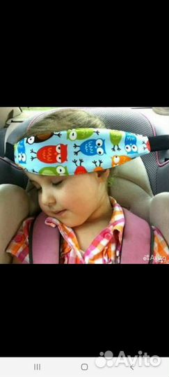Фиксатор головы ребёнка в автокресле