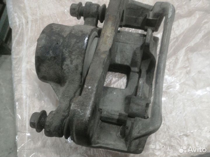 Суппорт мицубиси галант