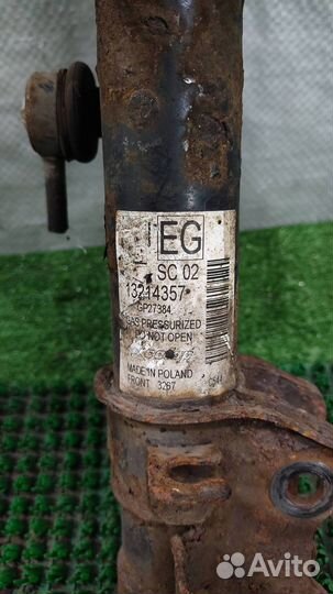 Стойка амортизатора передняя левая Opel Corsa D 2