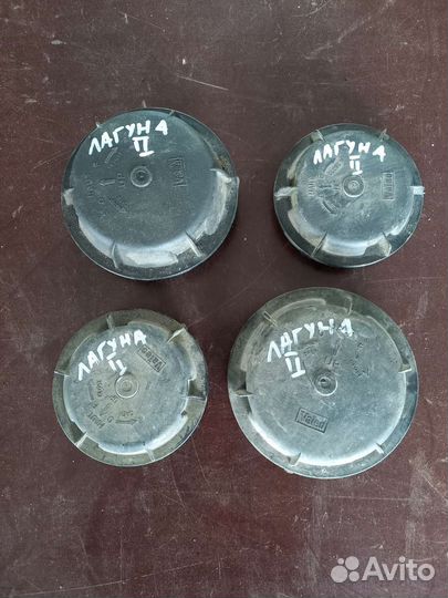 Колпачки на фары. Рено лагуна-2