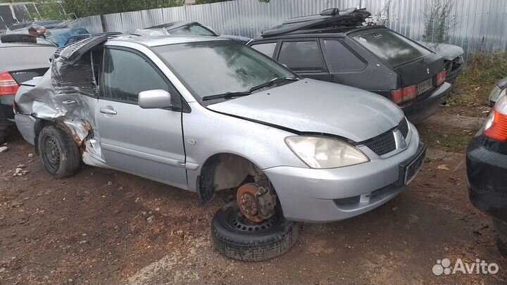 Стойка передняя правая левая Mitsubishi Lancer 9