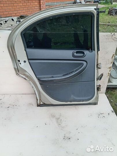 Дверь задняя левая на додж стратус 2003г