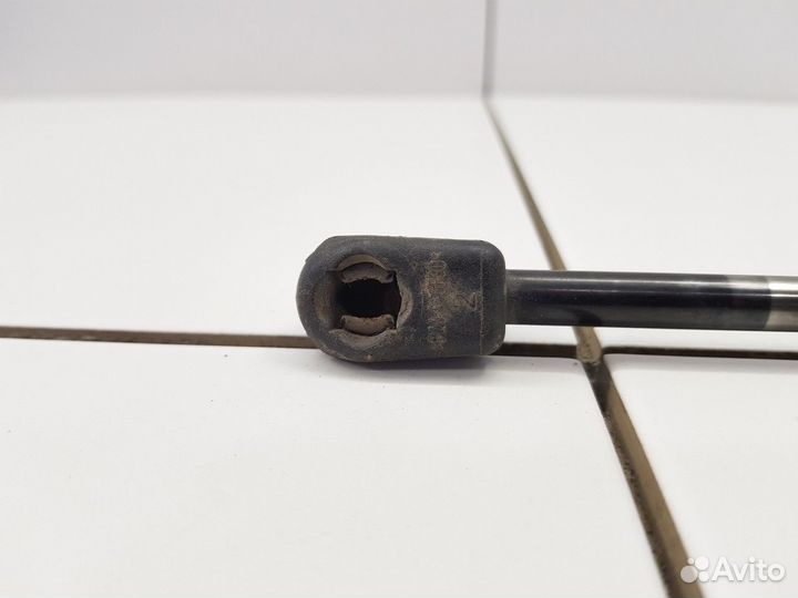 Амортизатор багажника левый (Mazda 3)