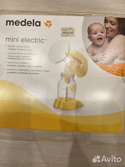 Молокоотсос medela электрический