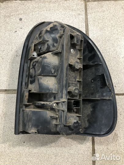 Фонарь задний левый dodge ram van caravan Chrysler