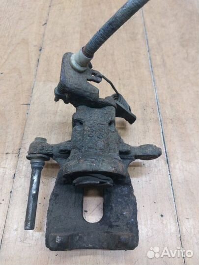 Тормозной суппорт задний левый Ford Mondeo cjba