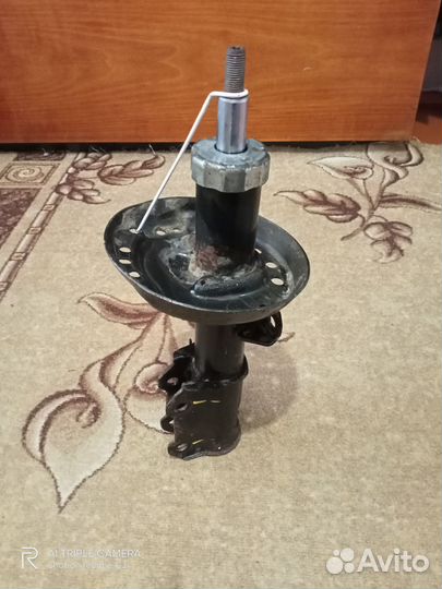 Амортизатор передний левый опель астра j