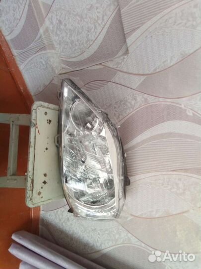 Фара передняя левая logan1