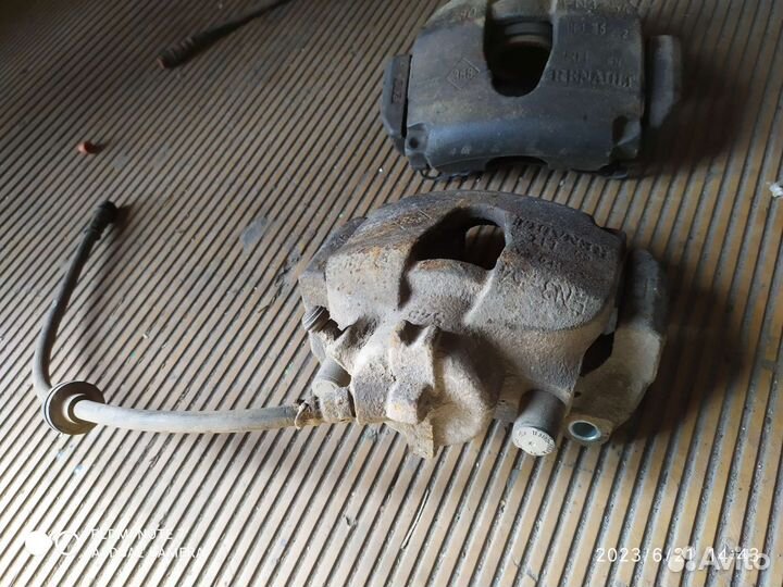 Суппорта передние лев и прав рено сценик2