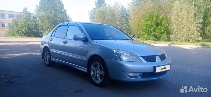Mitsubishi Lancer 1.6 МТ, 2006, 294 335 км