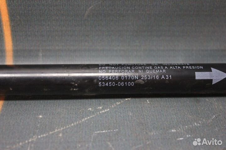 Амортизатор капота левый - Toyota Camry V50