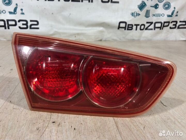Фонарь крышки багажника левый Mitsubishi Lancer 10