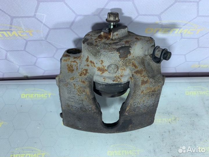 Суппорт тормозной передний левый Opel Astra G