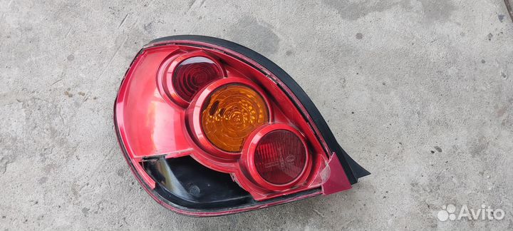 Фонарь задний левый Nissan Almera N16e hatchback