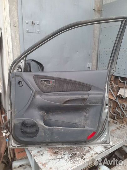 Передняя правая дверь Hyundai Tucson 1