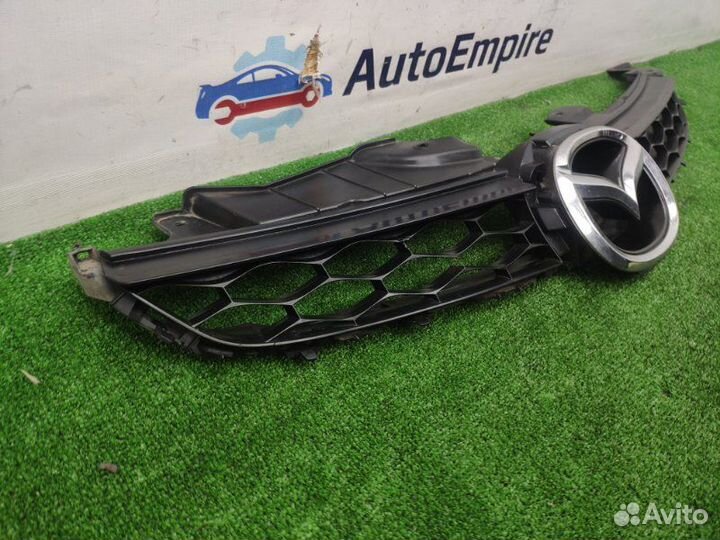 Решетка радиатора Mazda Cx-7 ER 2011