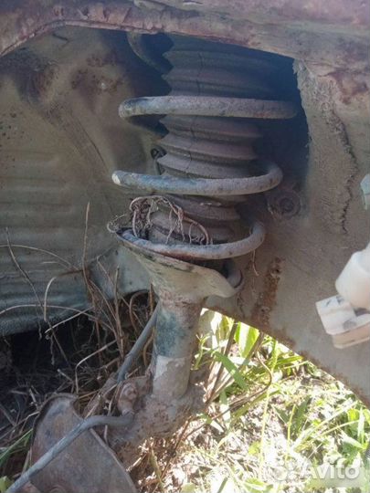 Амортизатор пружина передний Honda Concerto