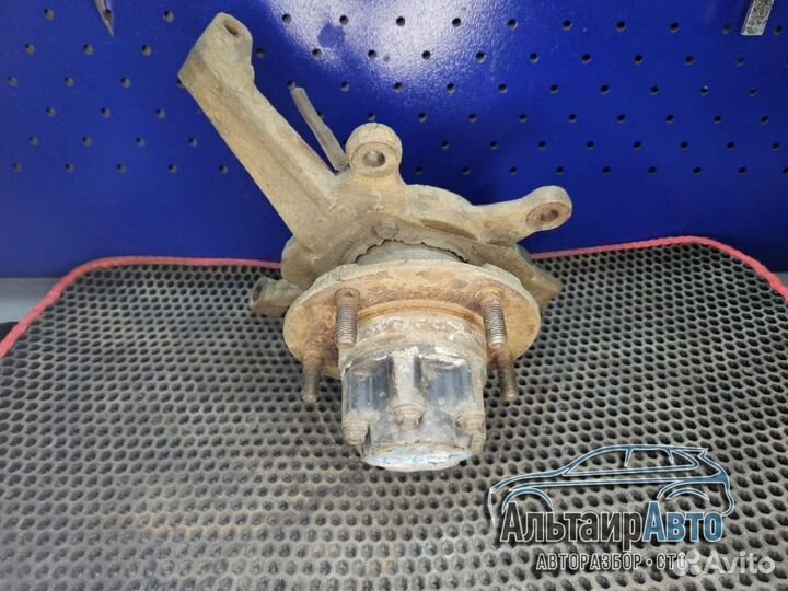 Передний левый поворотный кулак Kia Sportage 1