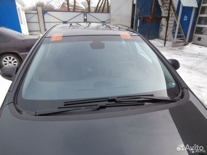 Лобовое стекло на Opel Astra J