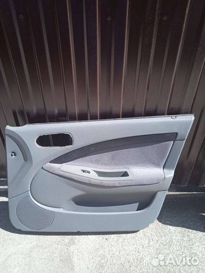 Обшивки передних дверей Chevrolet Lacetti
