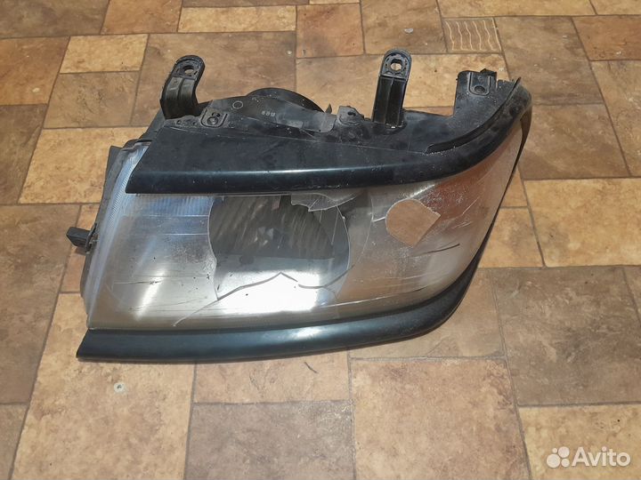 Фара передняя левая mitsubishi pajero